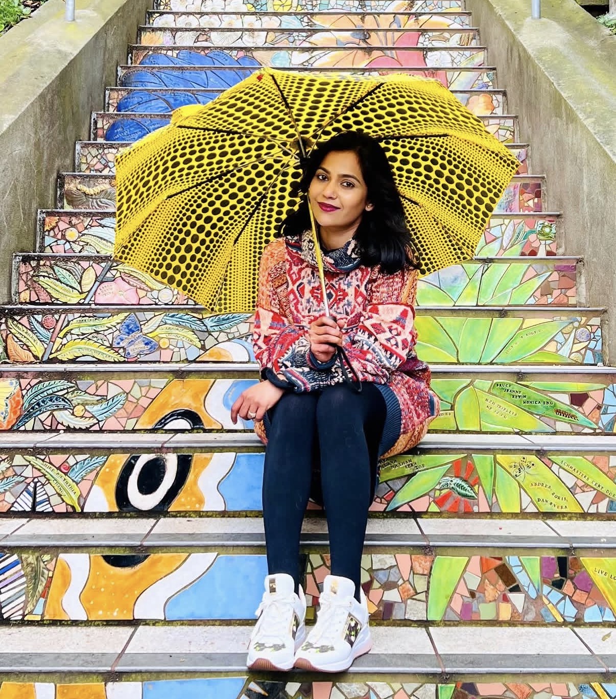 Guest enjoying San Francisco mosaic stairs
